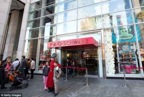 FAO Schwarz (pictured) on New York City's Fifth Avenue is being shut down by its owner, Toys R Us, due to its 'high and rising rental costs'. It will likely move to another midtown Manhattan location in 2016 (Source: Daily Mail UK)