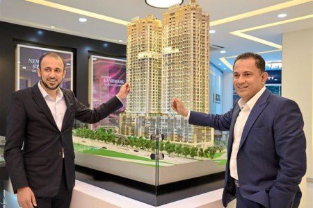 Jakel Trading Sdn Bhd group managing director and chief executive officer Mohamed Faroz (right) and chief operating officer Mohamed Nizam posing with a scale model of the J. Dupion development. (Photo: The Star)