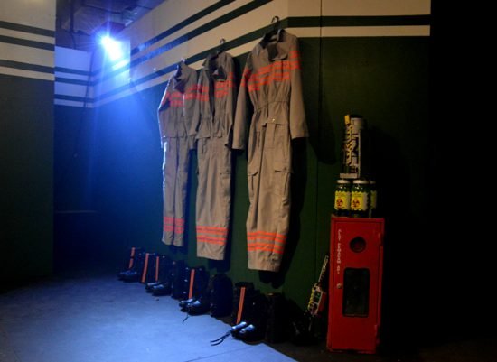 The Ghostbusters uniforms hang waiting to be used when they answer the call